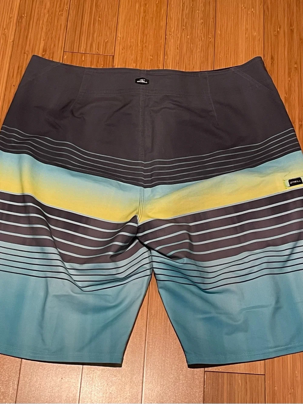 O'Neill Gray, Teal and Yellow Striped Board Shorts